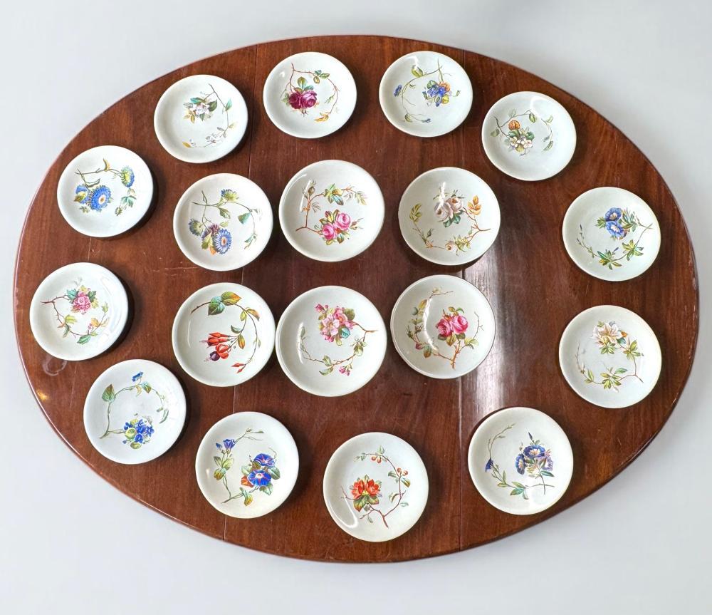 Brownfield & Son English bone china dessert service, hand-painted floral specimens on celadon ground, circa 1875