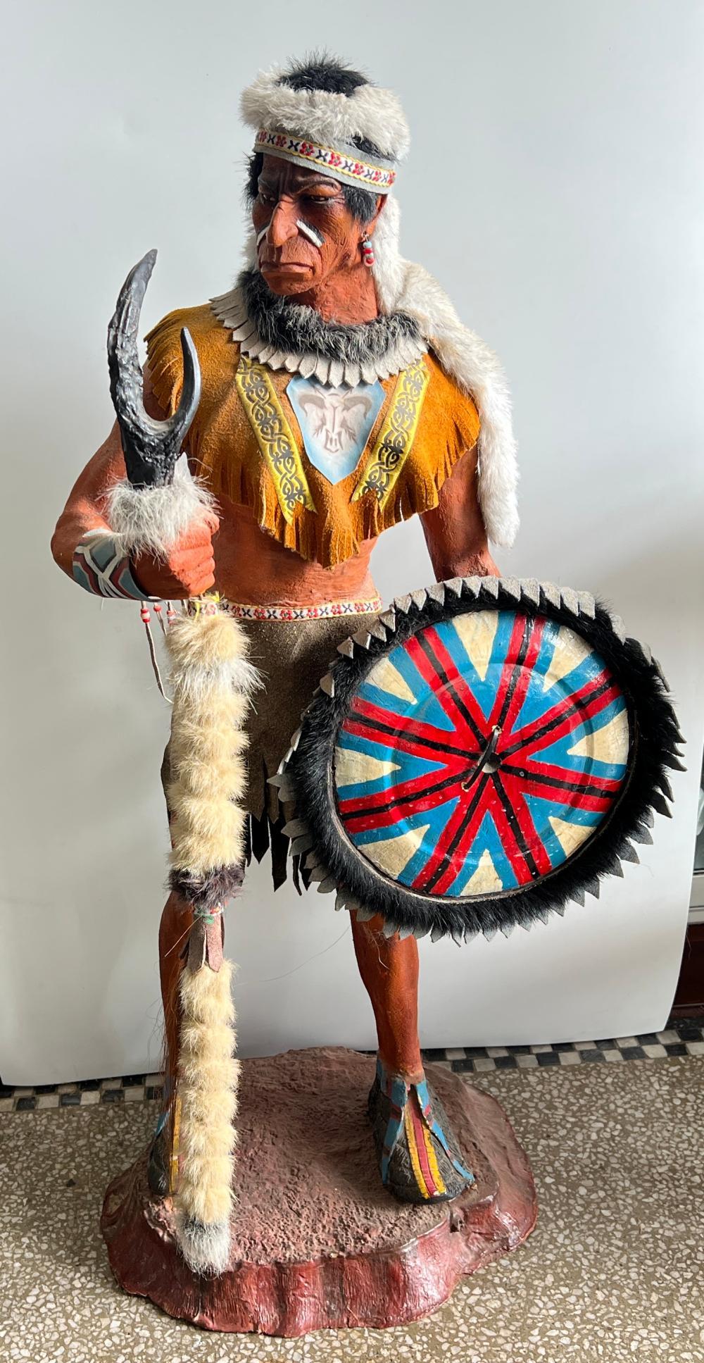 Large painted figure of a Native American warrior Late 20th C
