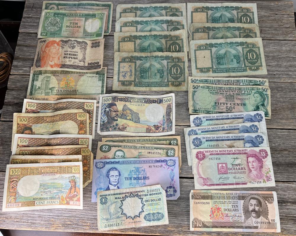 A collection of  banknotes from  Hong Kong, Borneo, Noumea Indonesian currency, c. 1960s–1990s