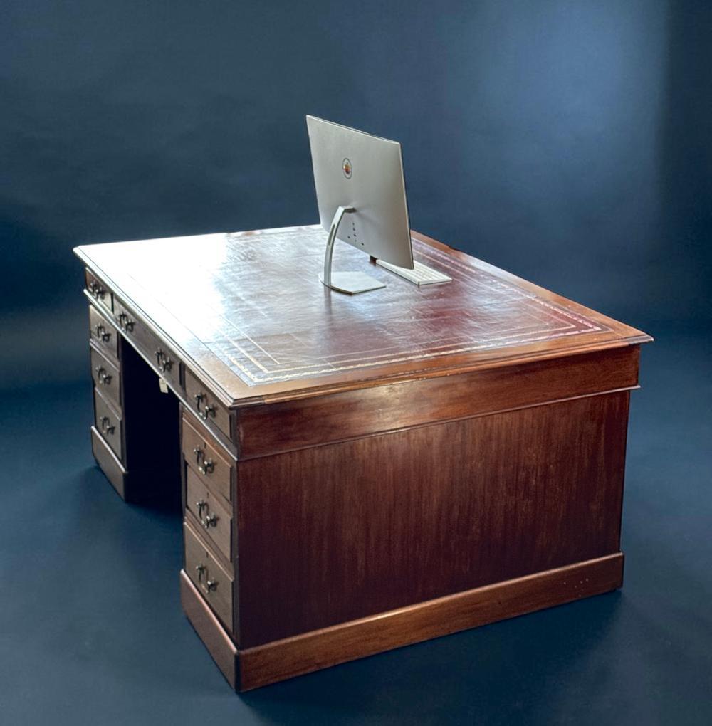 Australian cedar partners desk, rectangular leather-inset top, pedestal base with drawers and cupboards, circa 1880