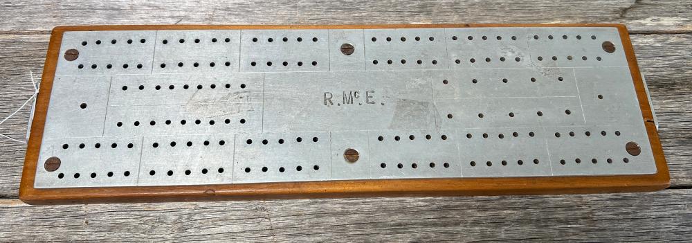 Aluminium and hardwood three-player cribbage board, monogrammed 'R.McE.', c.1930–50