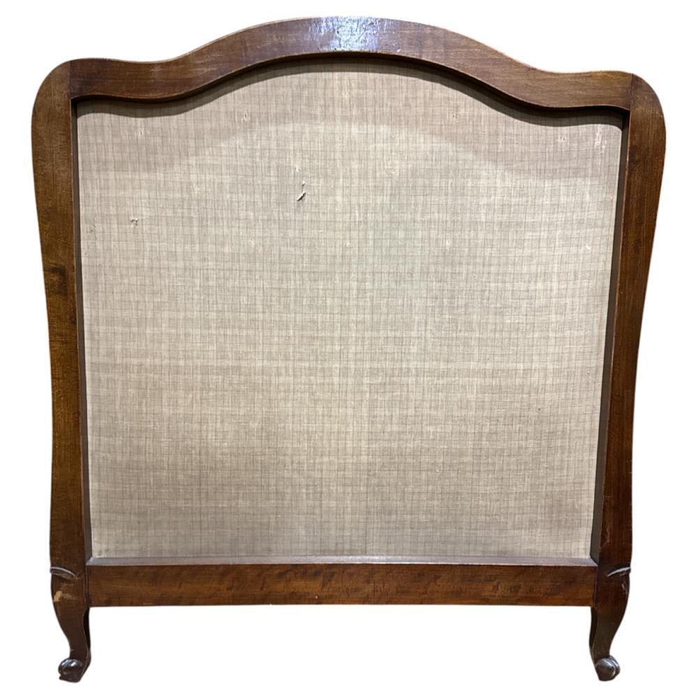 French upholstered bed head with scroll feet, early 20th century