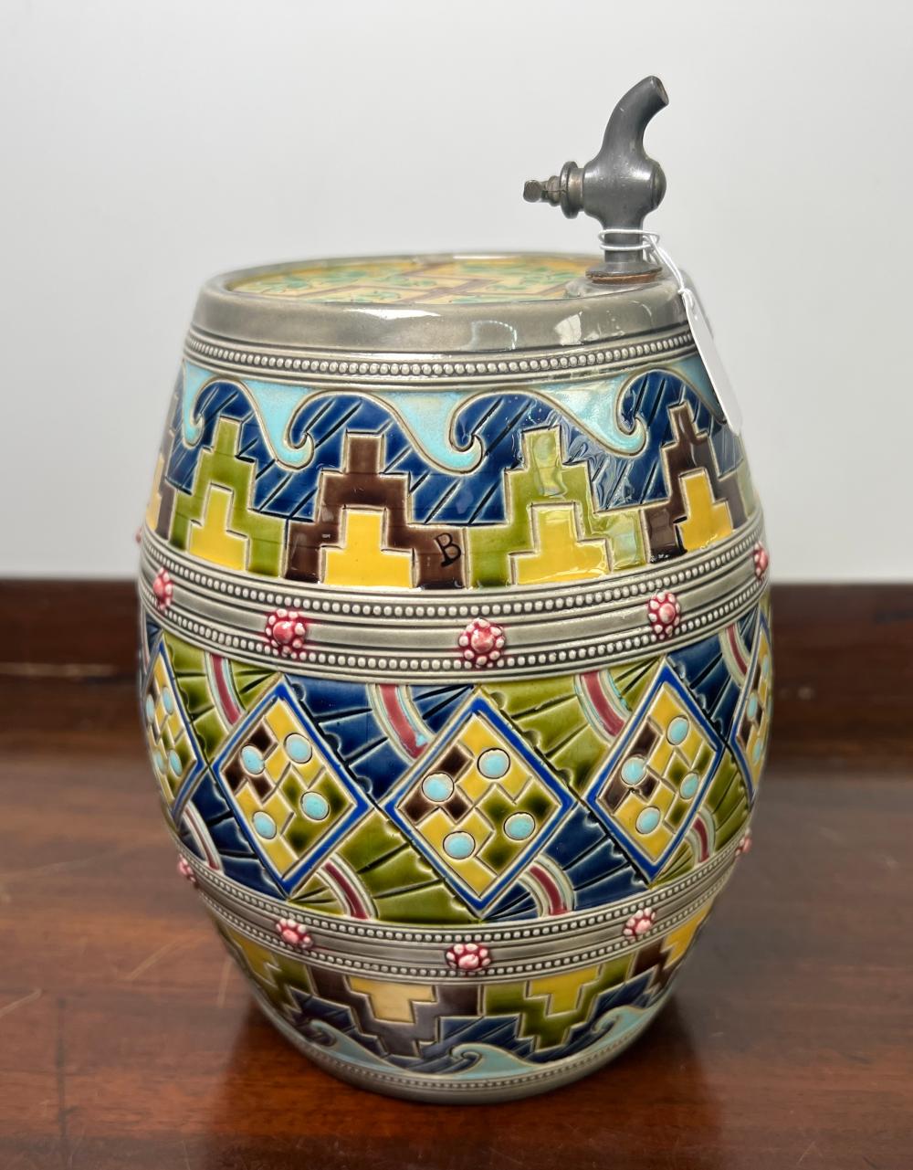 English majolica spirit barrel, hand-incised geometric decoration in the Aesthetic manner, pewter tap, circa 1880