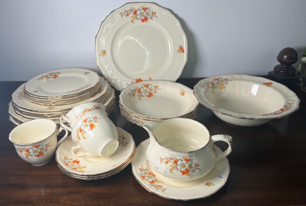 Meakin 'Marigold' English pottery part dinner service, cream ground with orange and white floral sprays and silver lustre borders, circa 1930s–1940s
