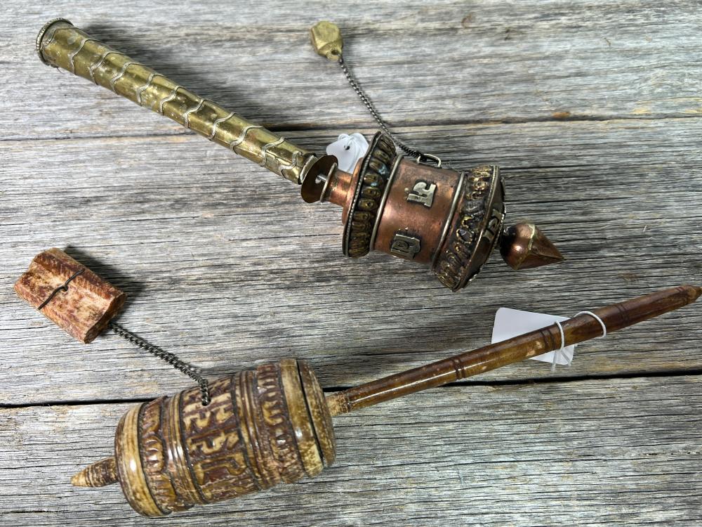 Two Tibetan Buddhist hand-held prayer wheels, copper and brass, and bone or horn with wooden handle, 20th century