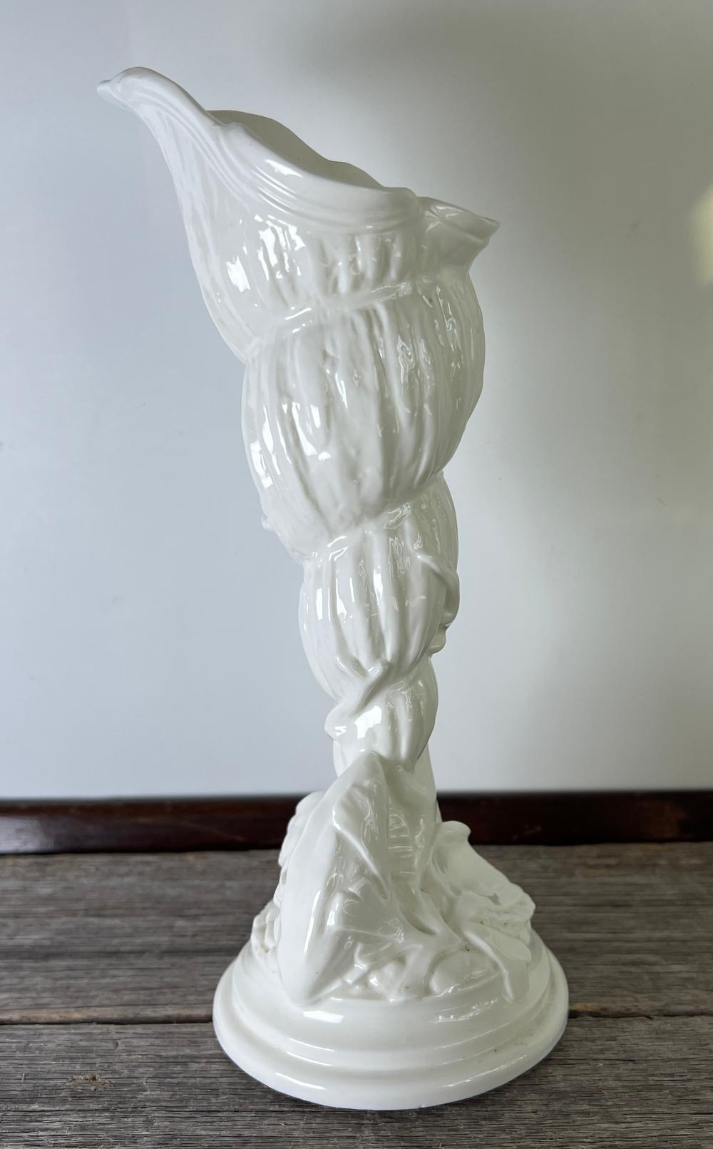 Royal Worcester bone china nautilus shell vase on coral base, mid-20th century