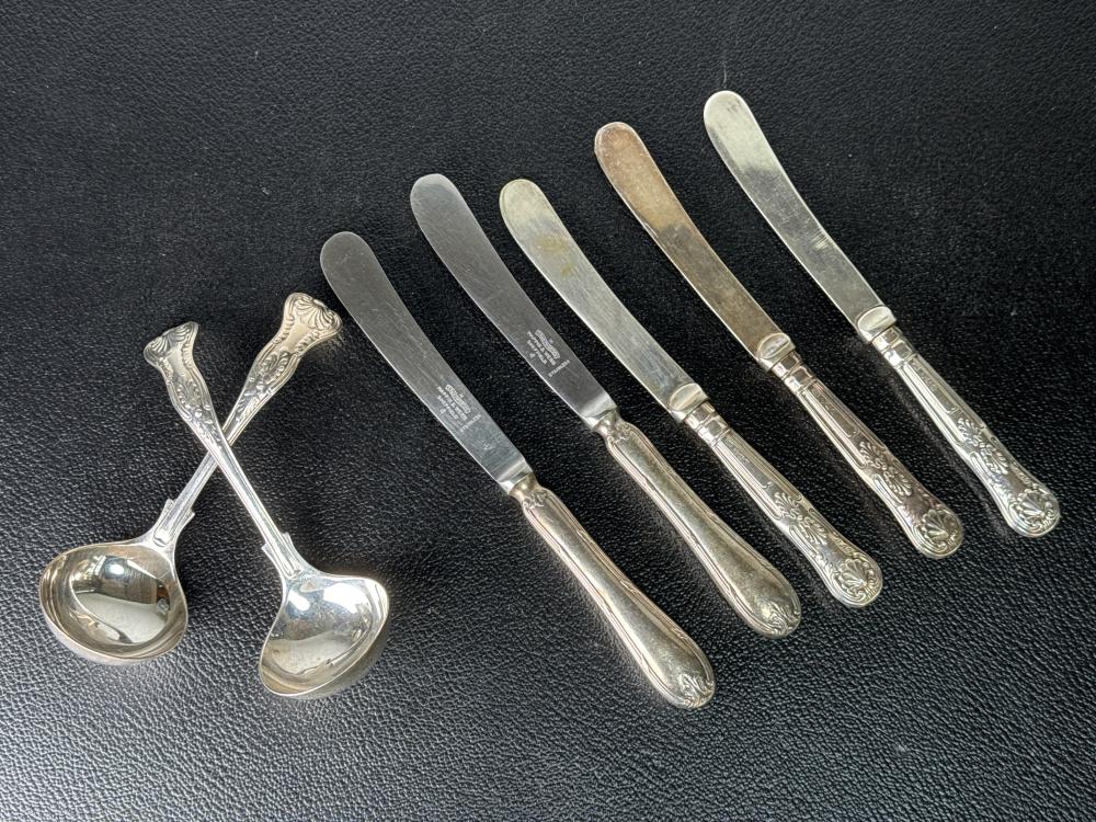 Silver and silver-handled flatware, comprising two sauce ladles and five butter knives, Kings pattern, Sheffield, 1930 and 1968