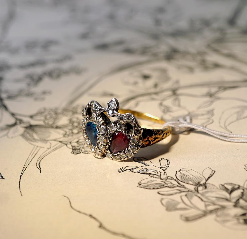 Double heart 18ct gold ring set with colourful paste red & blue 'hearts' + old-cut diamonds, 19th c.