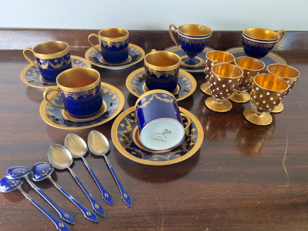 Group of cobalt blue and gilt porcelain tableware and glassware, 19th century
