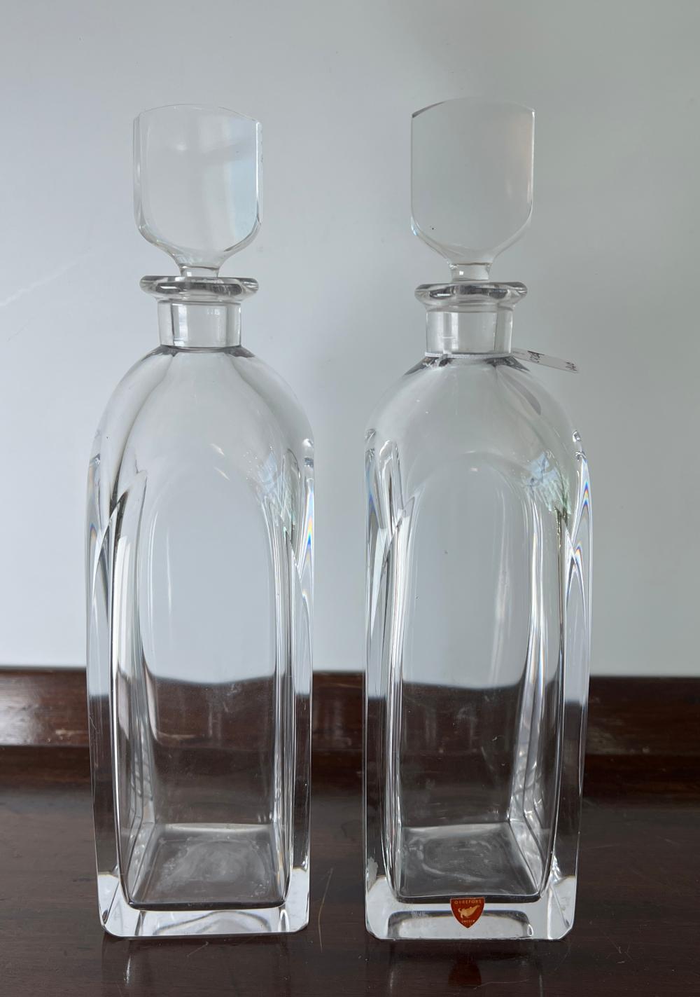 Pair of Orrefors Swedish crystal decanters with original stoppers, 20th century