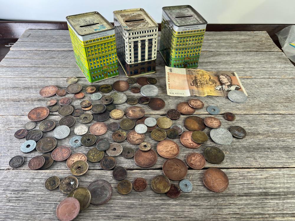 Mixed collection of Australian coins, banknotes and Commonwealth Bank building-form money boxes, 20th century