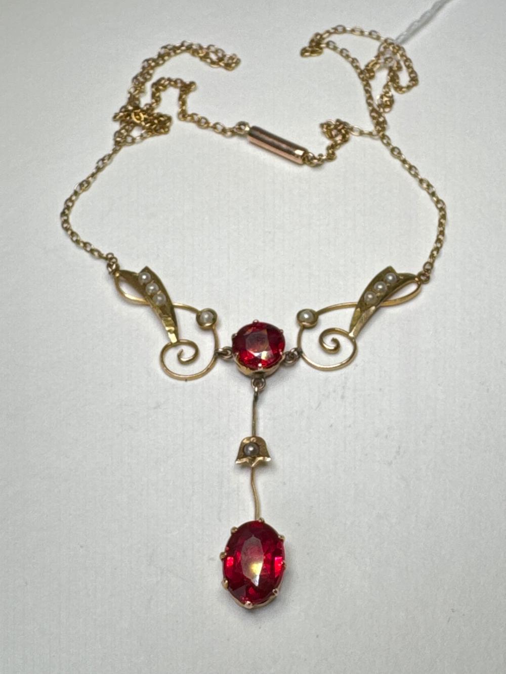 9ct gold Art Nouveau pendant necklace, set with red paste stone and seed pearls, retailed by Willis & Sons, Melbourne, circa 1900-1910