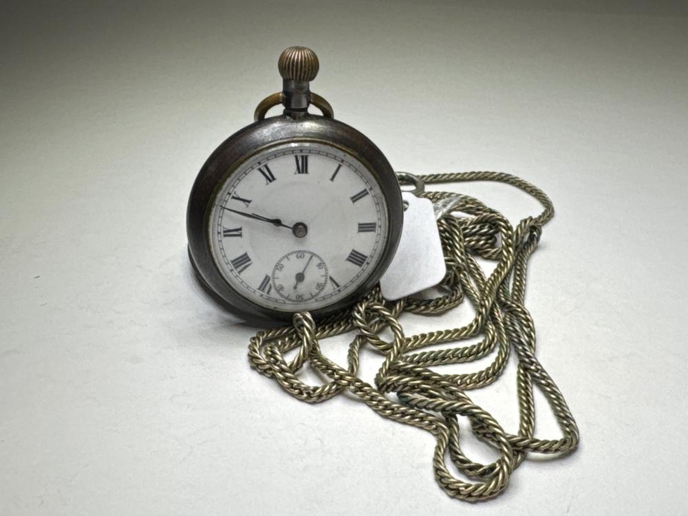 Gunmetal pocket watch on base metal chain, Swiss made, late 19th to early 20th century