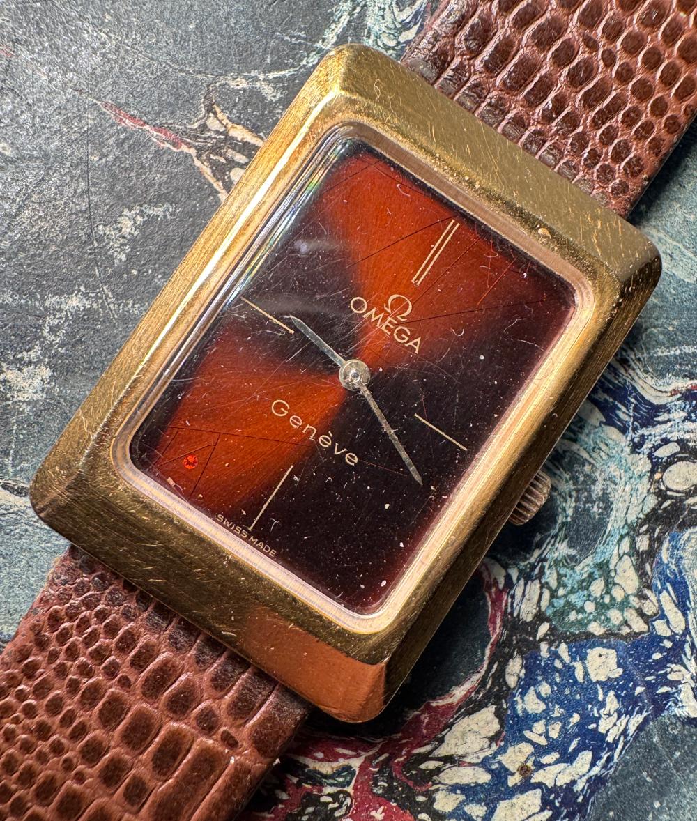 Omega Geneve rectangular gold-plated wristwatch with tiger's-eye dial and lizard-grain leather strap, circa 1970s