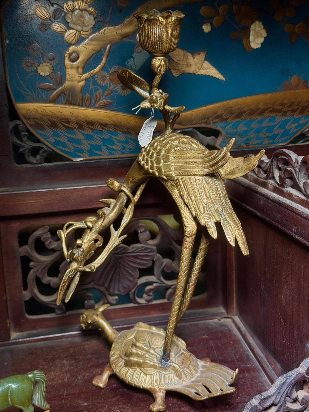Japanese gilt bronze candlestick modelled as a crane standing on a turtle, Meiji period, late 19th century